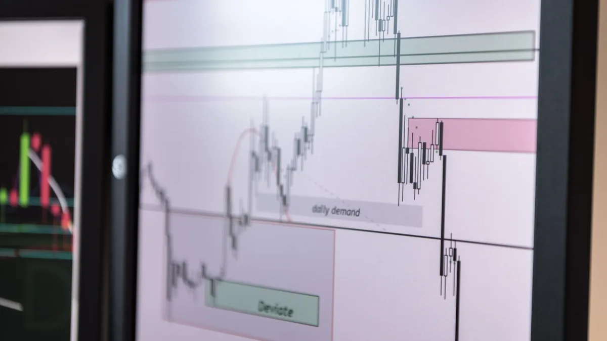 A framed chart with a graph and text, possibly a stock market or financial chart, displayed on a wall or in an office setting.